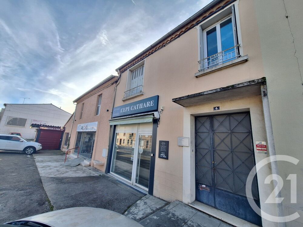 LAROQUE D OLMES Immeuble de rapport avec rentabilité....
