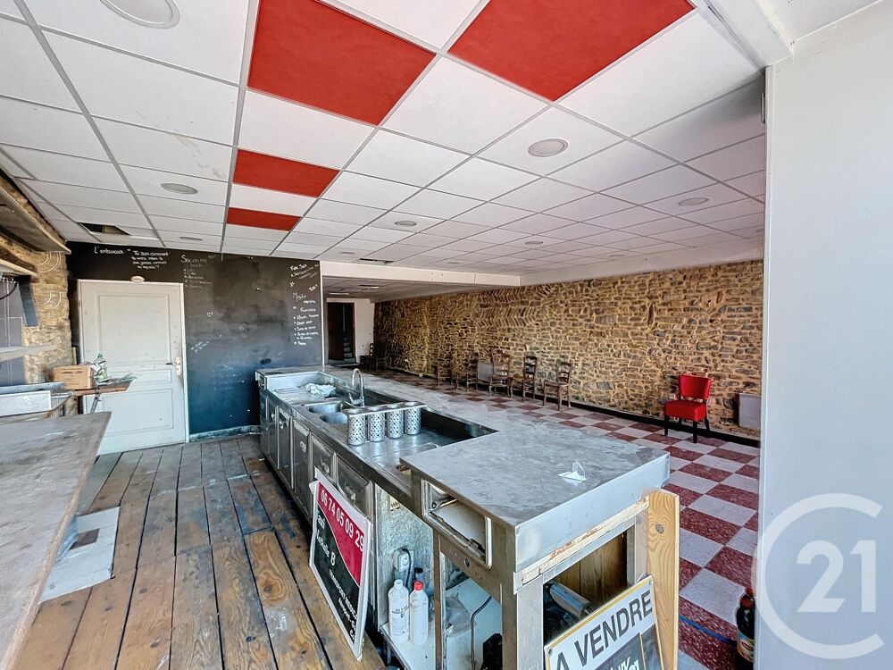 Ensemble immobilier à réhabiliter à Connaux Opportunité....