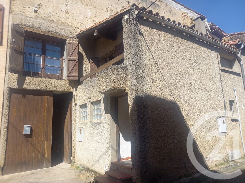 Maison de village avec balcon et garage à rénover dans l....