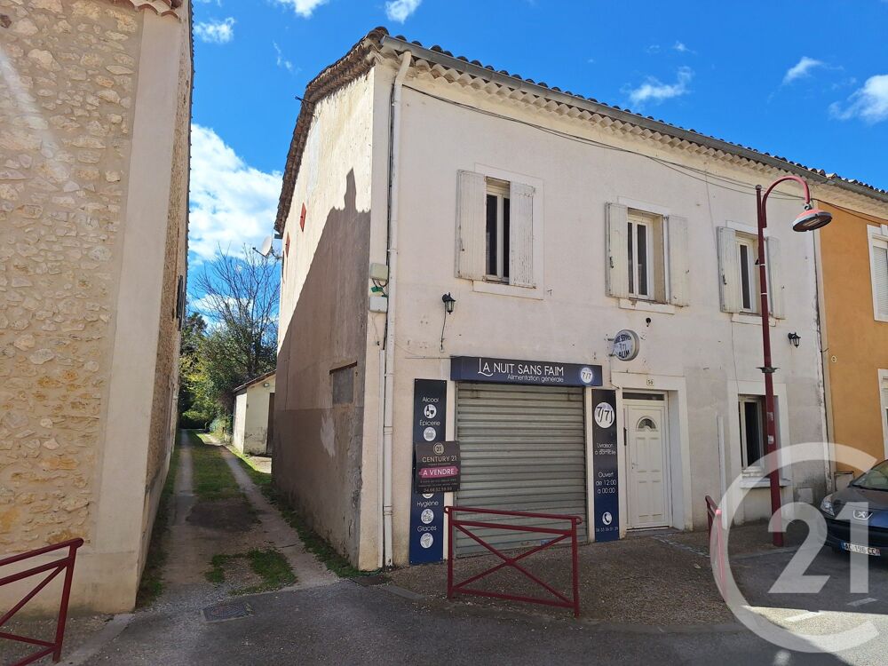 Maison de ville bien située à proximité des commerces et....