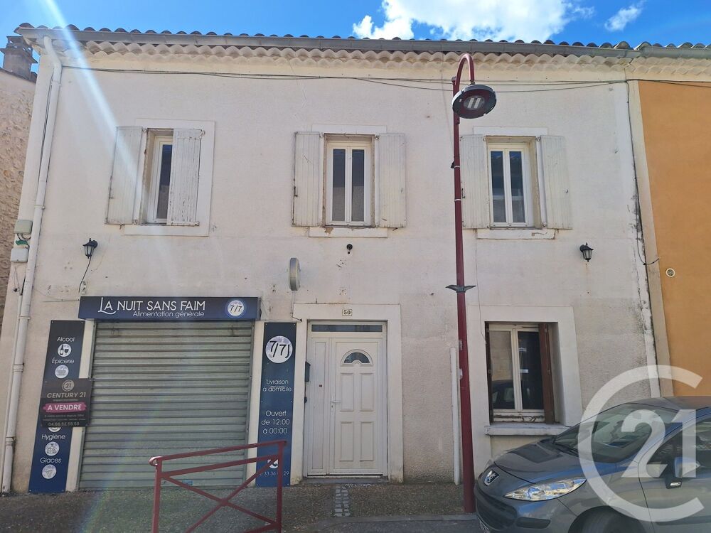Maison de ville bien située à proximité des commerces et....