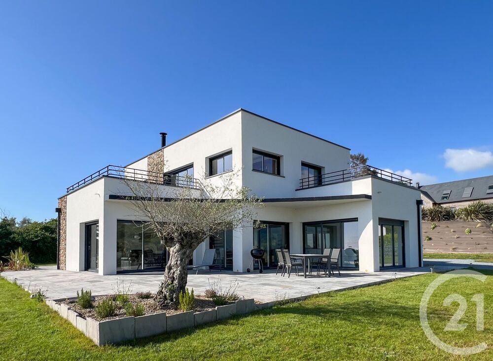 Découvrez cette superbe maison contemporaine située à Ba....