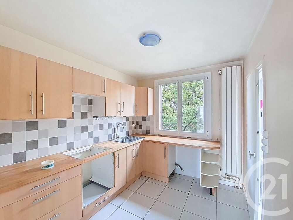 Appartement T3 avec balcon et cave dans un écrin de ver....