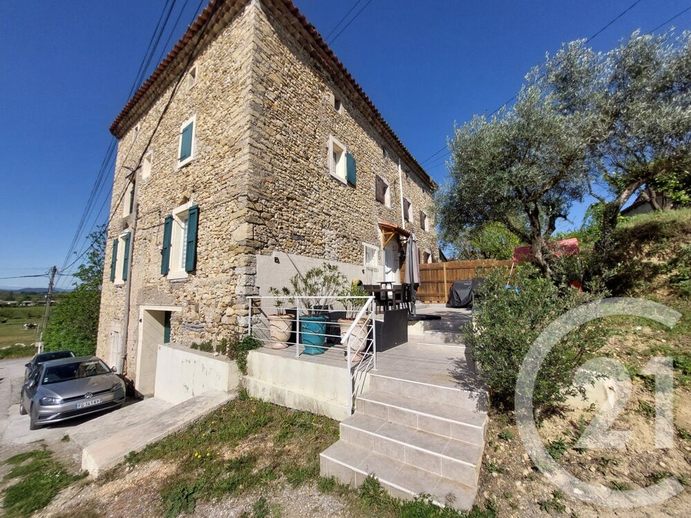 Au c½ur du village de Lézan, venez découvrir cette charm....