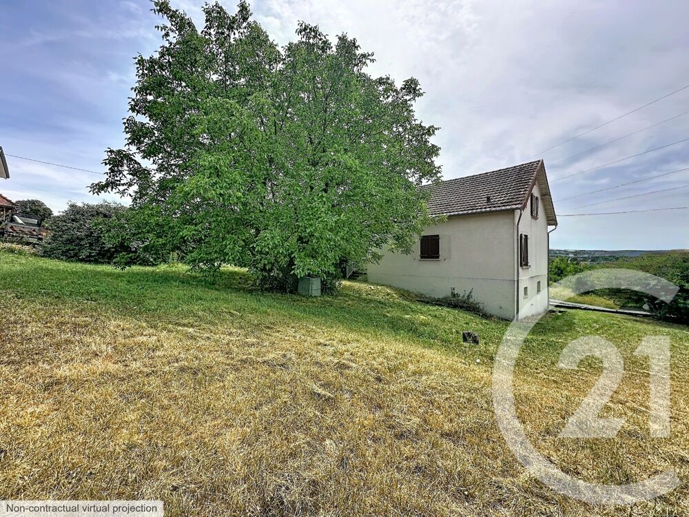 Nichée dans le calme de Taillecourt, cette maison de cin....
