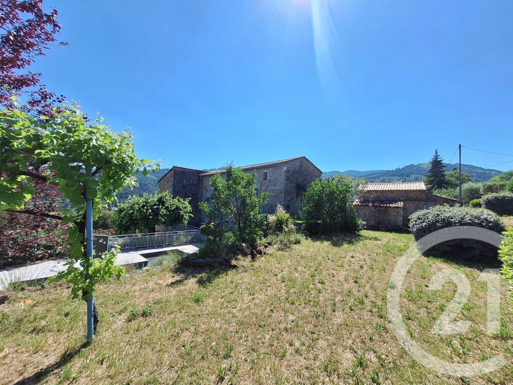 Aux portes des Cévennes, propriété de charme proposant :....