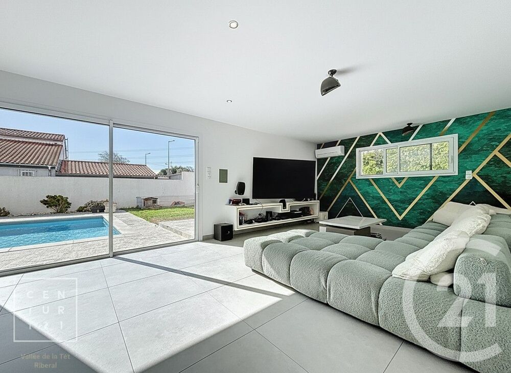 Nichée au c½ur de Le Soler, cette maison familiale de 16....