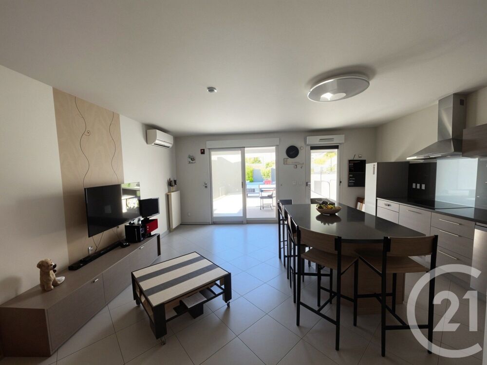 Découvrez ce superbe T3 récent en rez-de-jardin, idéalem....