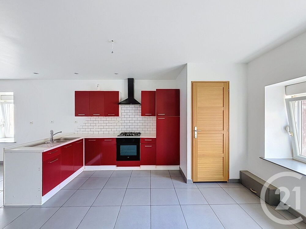 Century 21 Lure vous propose cette jolie maison de ville....