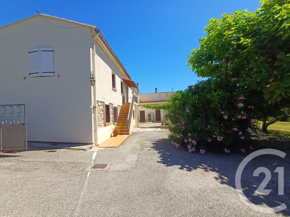 Venez découvrez cette jolie maison familiale mitoyenne d....