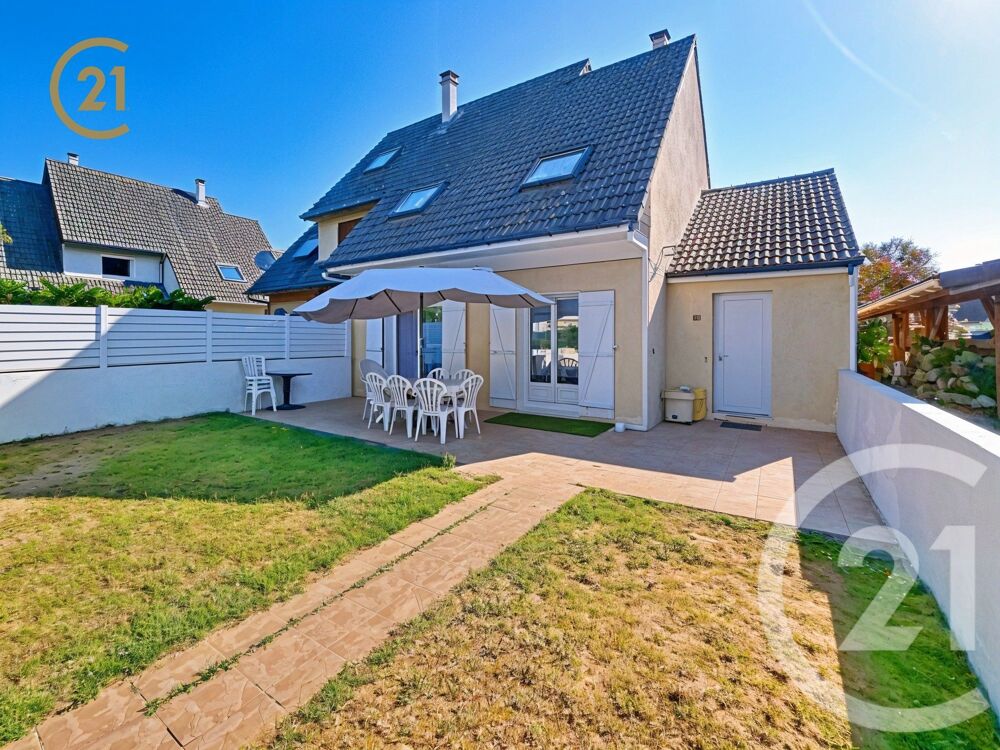 À vendre Charmante maison familiale avec jardin et gara....