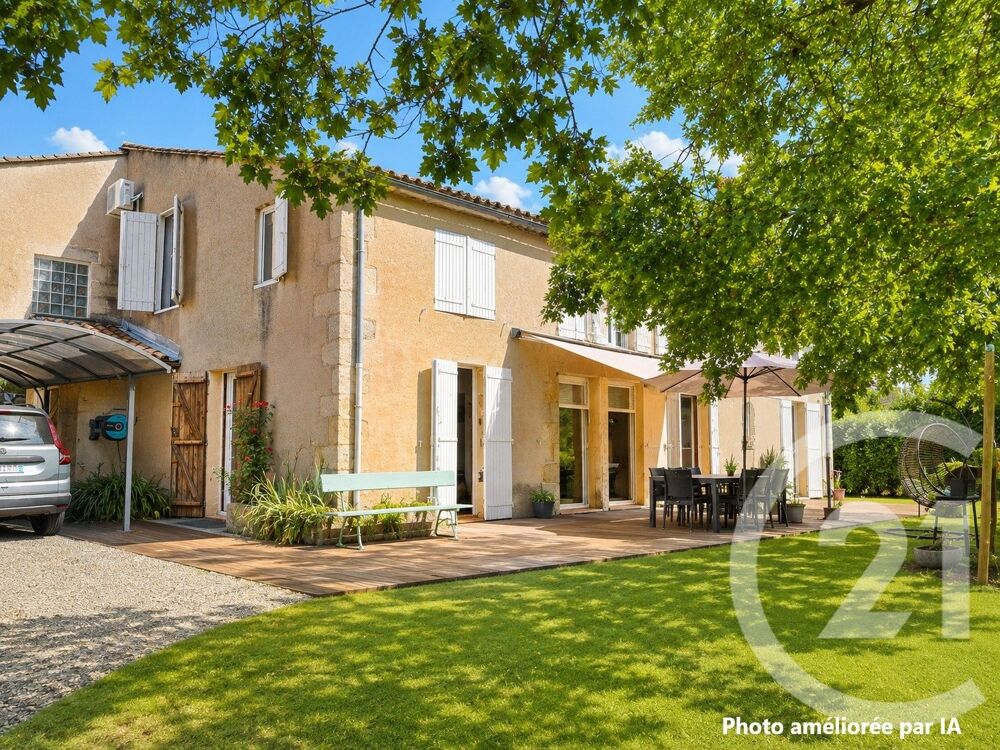 Au c½ur du village de Landiras, découvrez cette élégante....