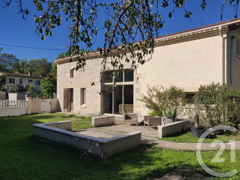 Découvrez cette magnifique maison alliant le charme de l....