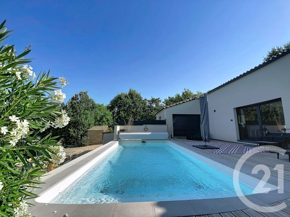 À vendre Maison contemporaine de plain-pied avec piscin....