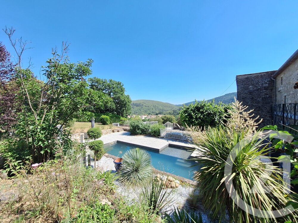 Aux portes des Cévennes, propriété de charme proposant :....