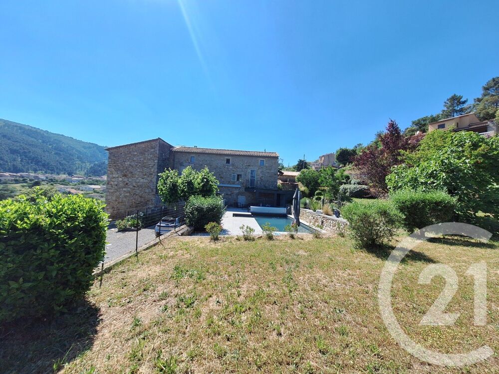 Aux portes des Cévennes, propriété de charme proposant :....