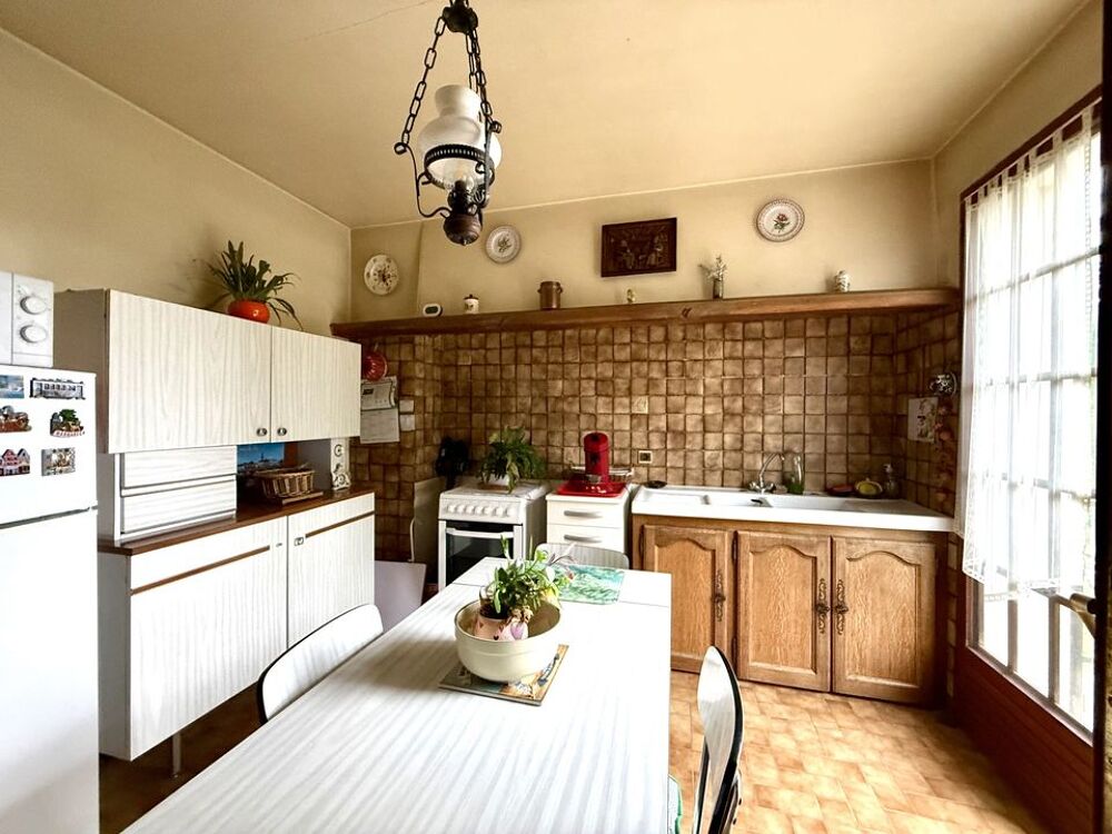 Pavillon élevé sur rez-de-jardin avec combles aménageables,