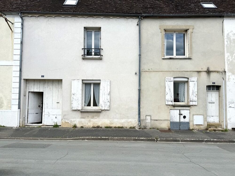 Maison de caractère avec dépendances et fort potentiel au