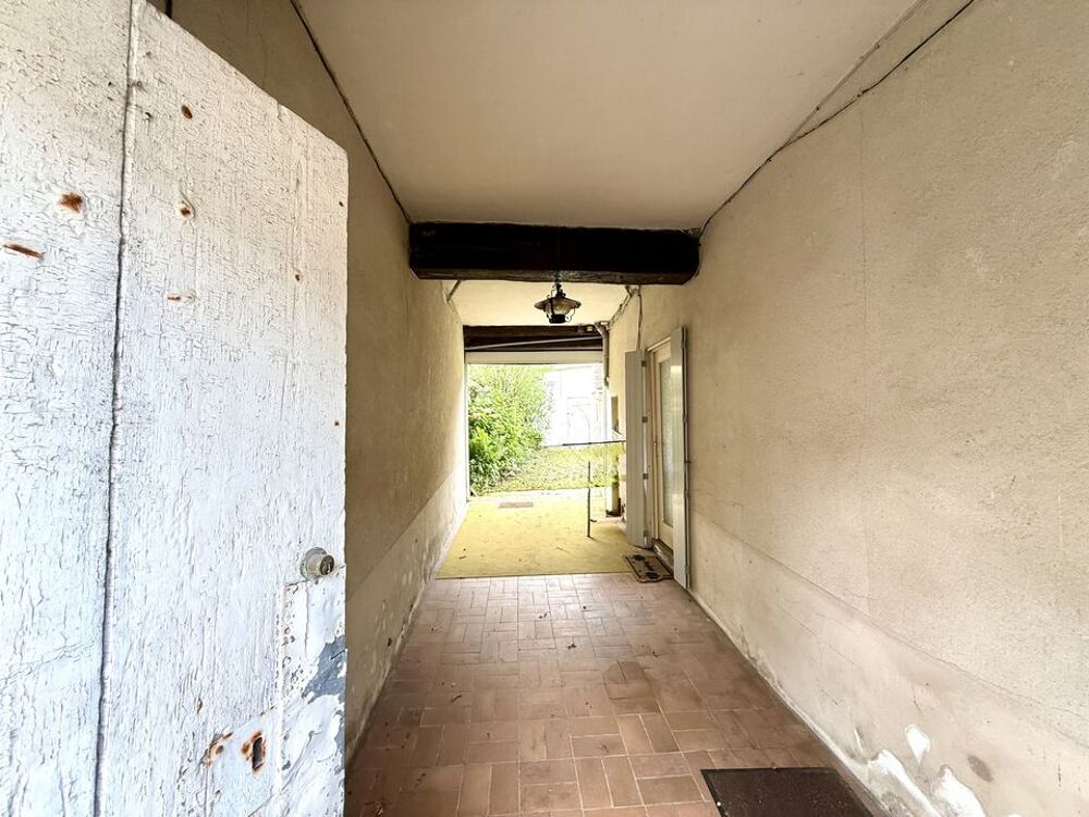Maison de caractère avec dépendances et fort potentiel au