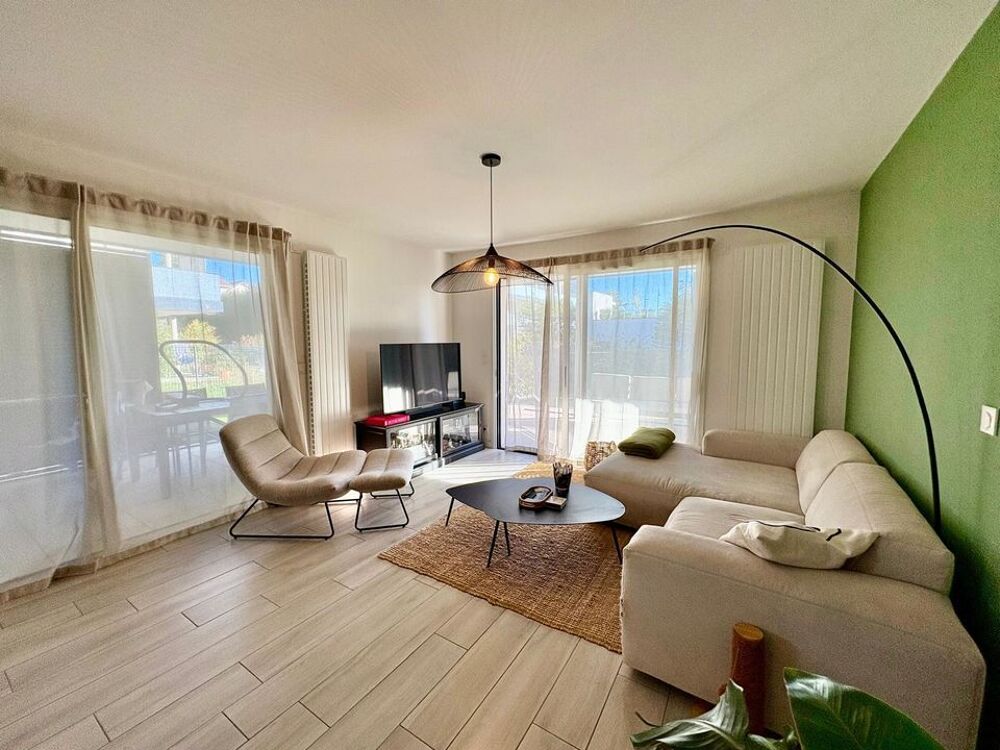 GRAND T2 60 M² AVEC JARDIN PRIVATIF, TERRASSE, GARAGE ET CAVE