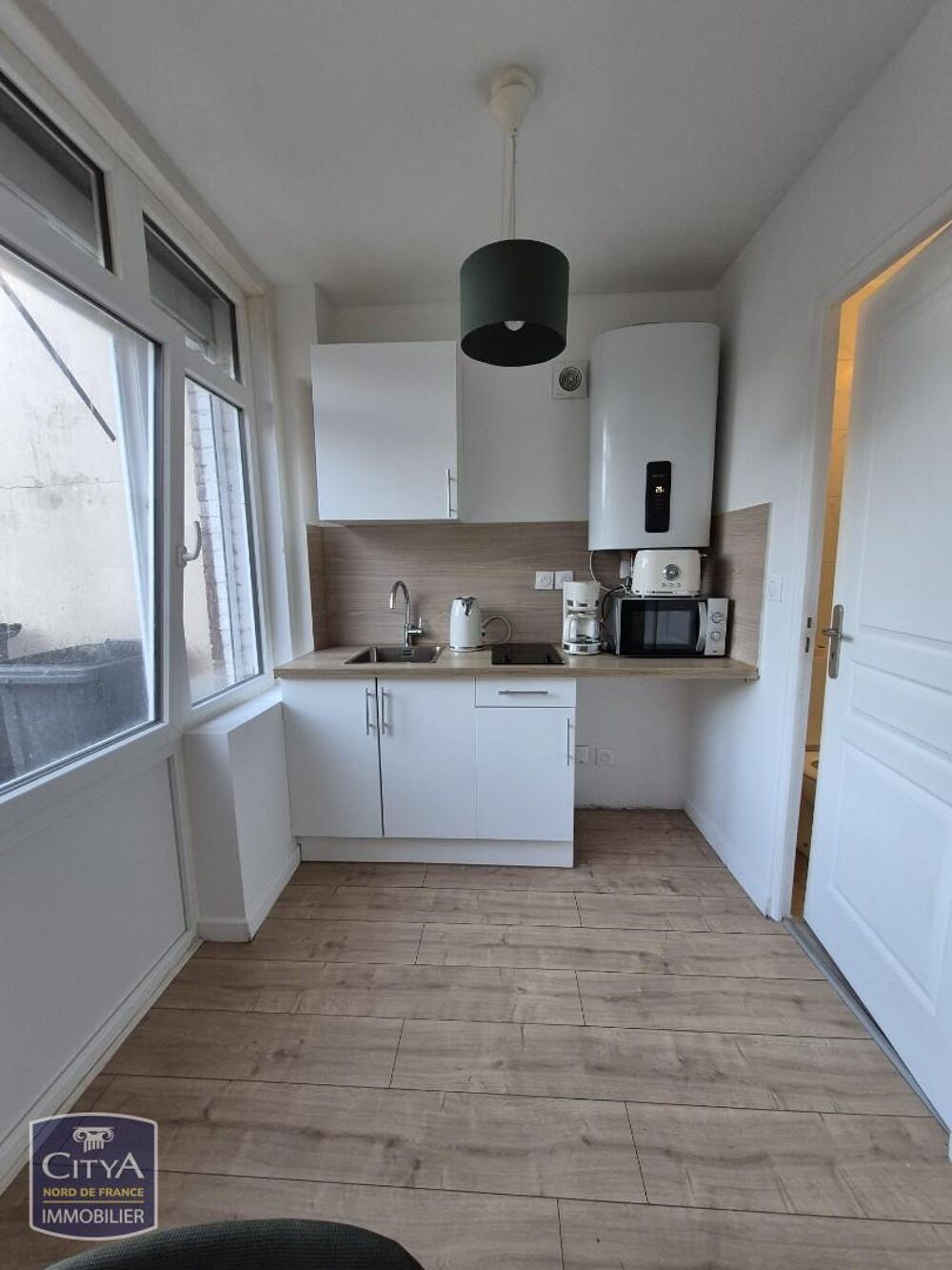 PROCHE DE LA GARE un Appartement de type 2 meublé situé en rdc avec jardin