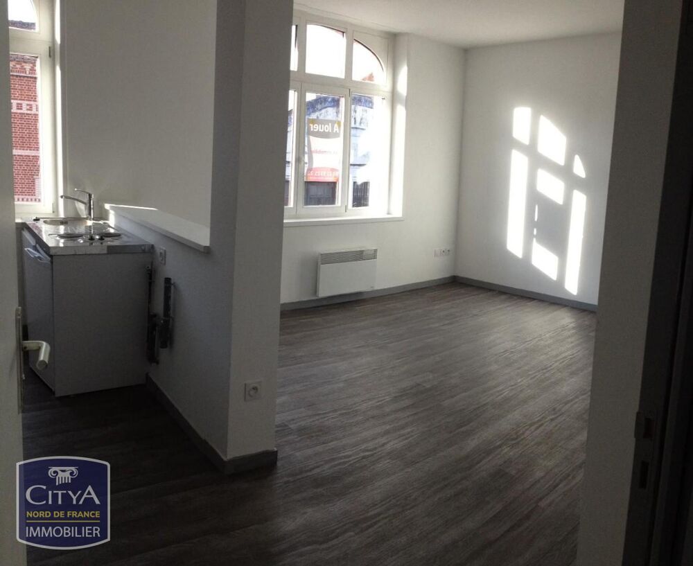 Appartement au 1er étage d'un petit immeuble en plein ce....
