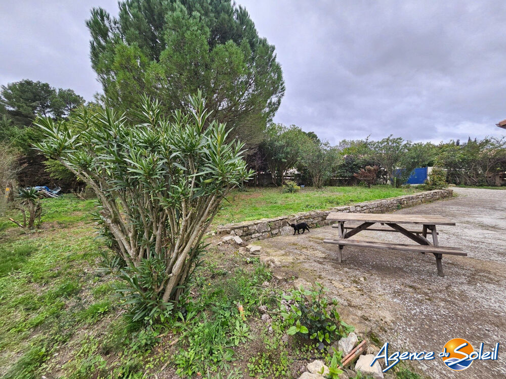 Maison plain-pied 98 m² avec garage et grand terrain