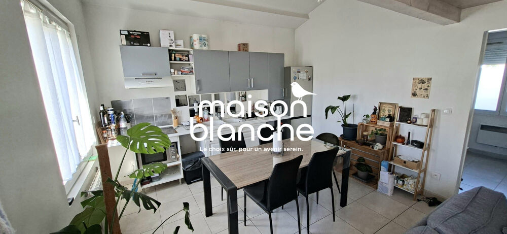 BEL APPARTEMENT AVEC JARDIN / STATIONNEMENT