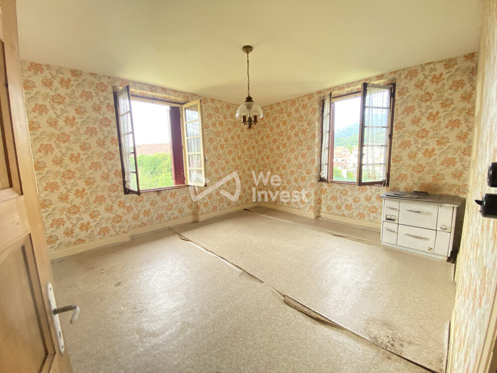 Bâtisse composée de 2 logements T3 de 65 m² chacun à Champfr