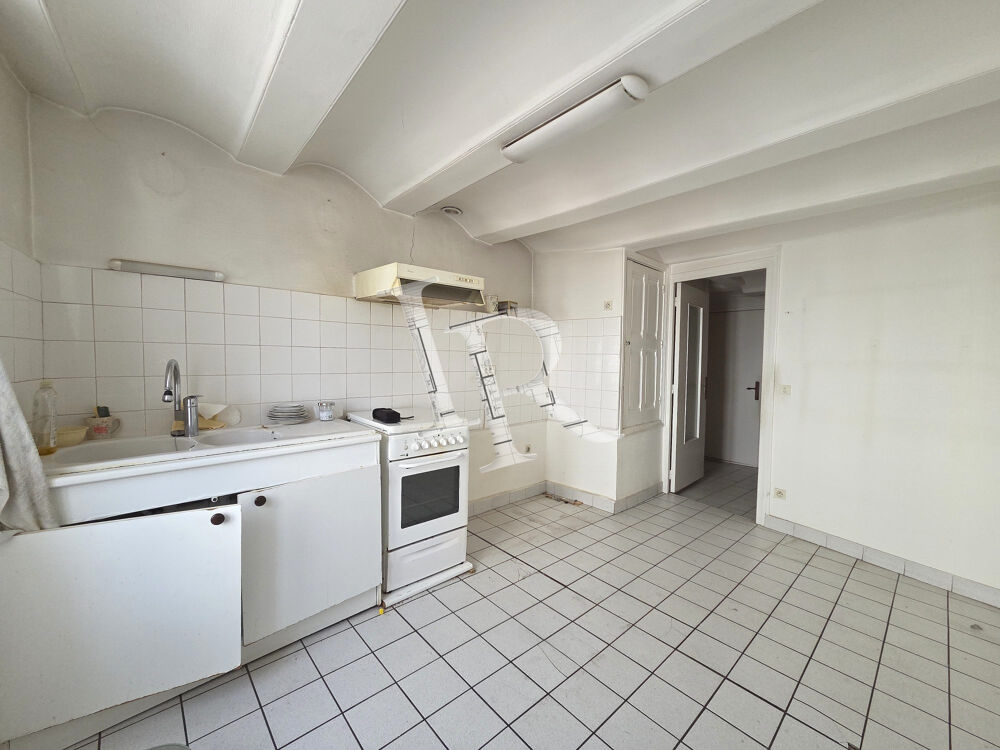 Maison à rénover avec 2 garages