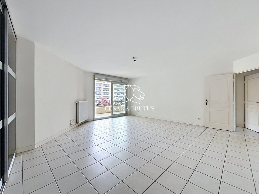 GRAND T4 EN ETAGE ELEVE AVEC BALCONS, CAVE ET GARAGE