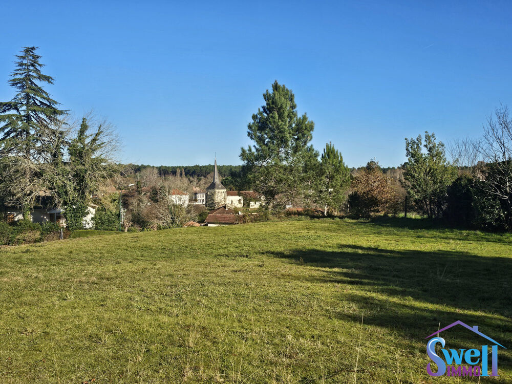   Terrain à bâtir de 1100m² avec vue panoramique sur le village 