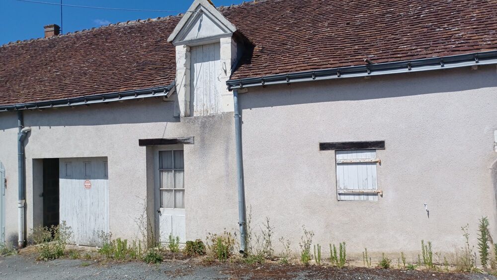 Ancienne de bourg avec terrain et garage et en plain-pied !