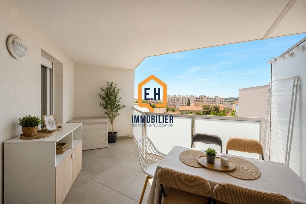 Appartement T2 en résidence récente avec stationnement privati
