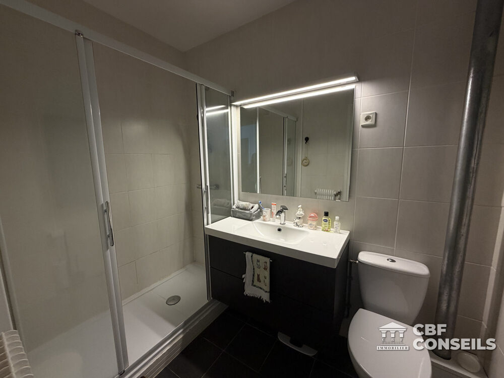 Appartement T2 récent avec terrasse, garage et locataire en pla