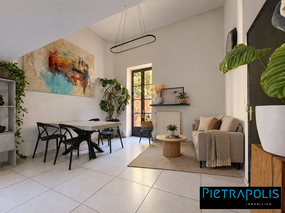 Appartement atypique de 100 m² au sol avec terrasse  Jusqu?
