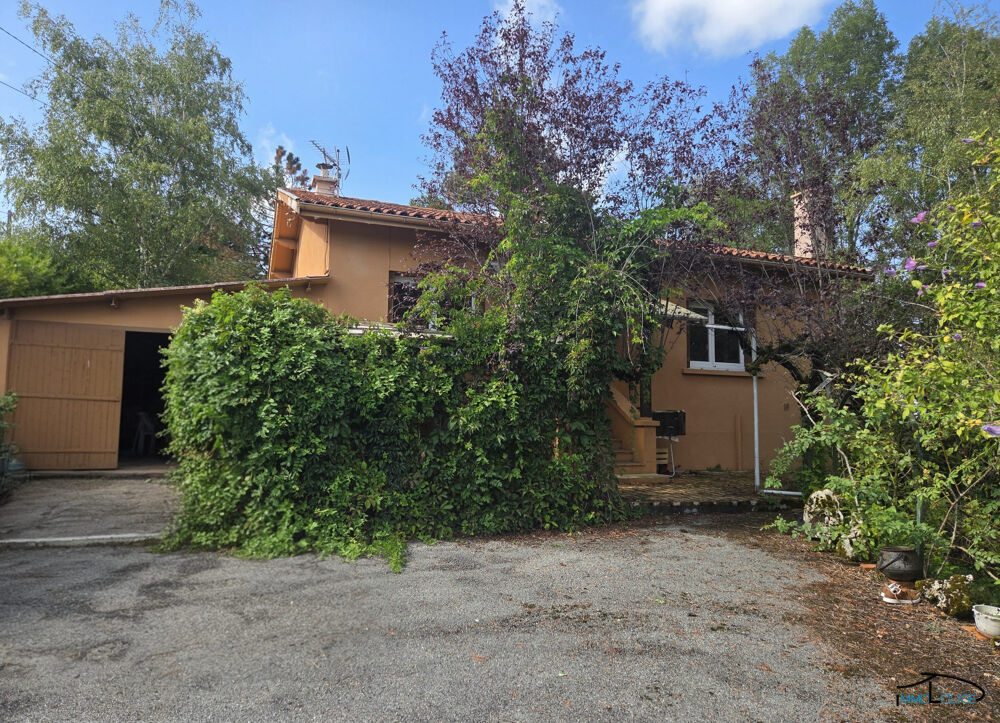 Maison avec grand terrain constructible