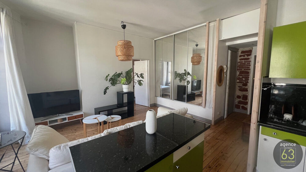 T3 de 48 m2, étage élevé, lumineux, grenier, vue Pariou,