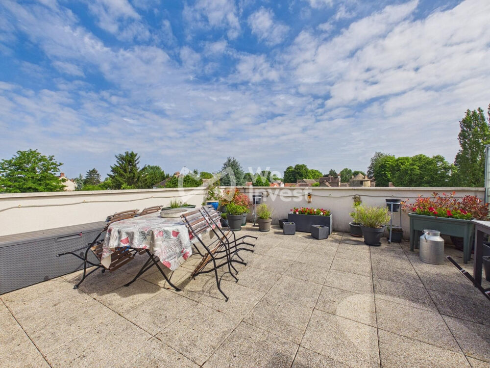 Dernier étage avec vaste terrasse en coeur de ville