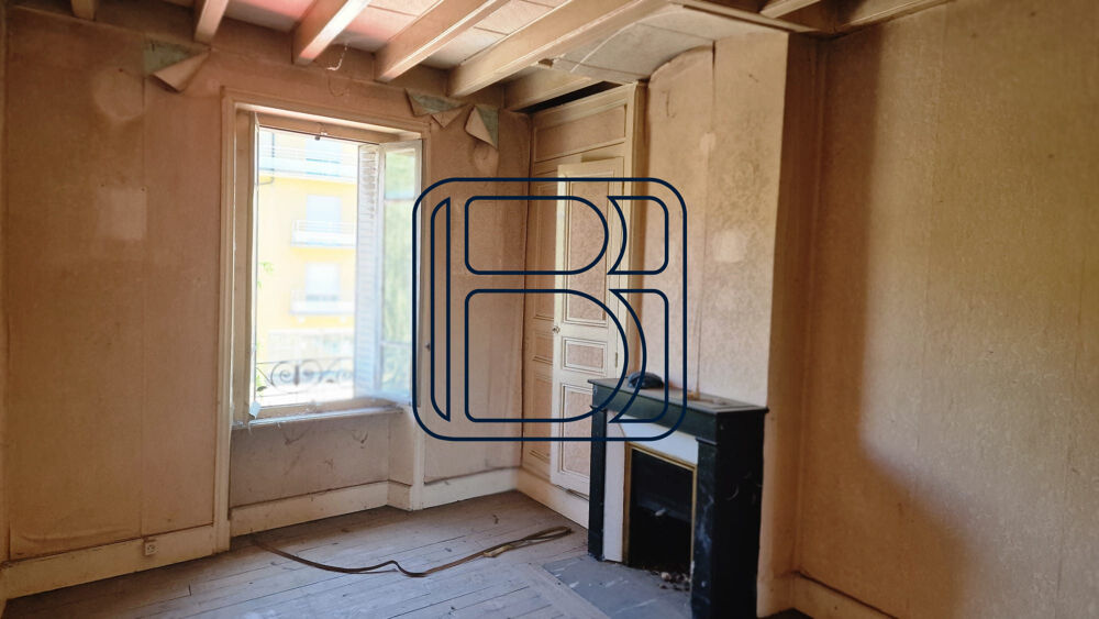 IMMEUBLE DE RAPPORT AVEC GARAGE ET TERRAIN ATTENANT