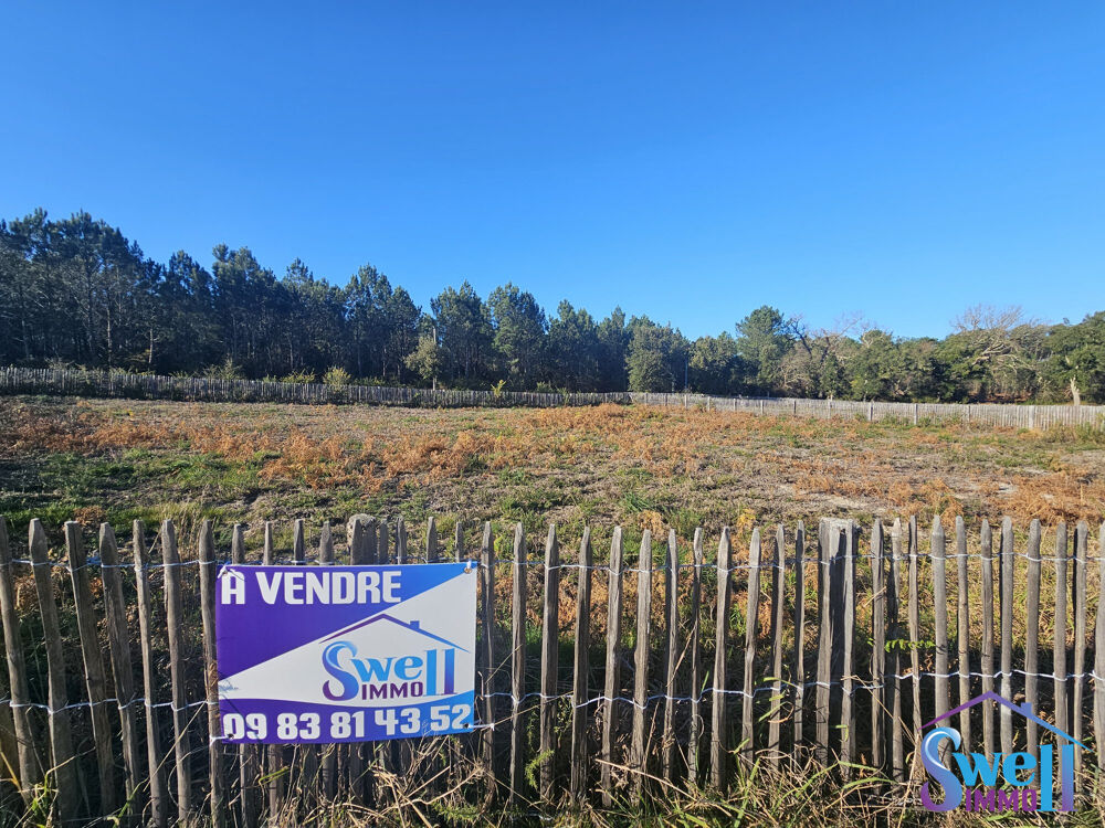   Face à la forêt, terrain à bâtir de 970m² raccordé, viabil 