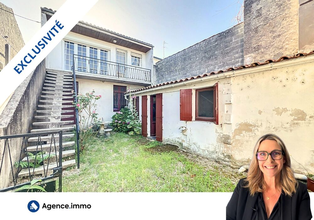 Maison duplex avec un local pro loué et garages