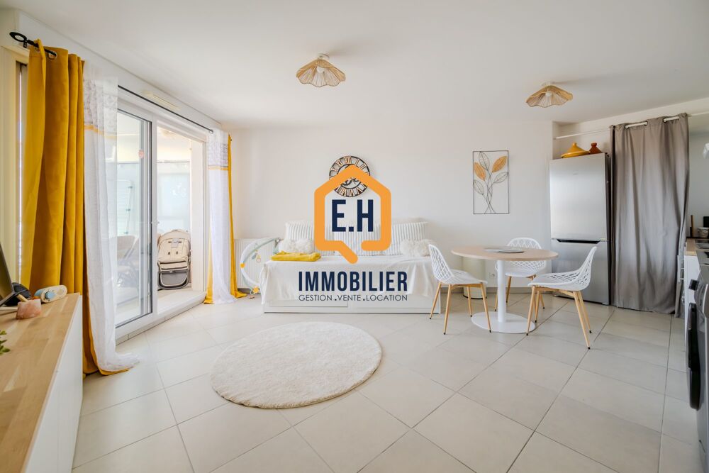 Appartement T2 en résidence récente avec stationnement privati