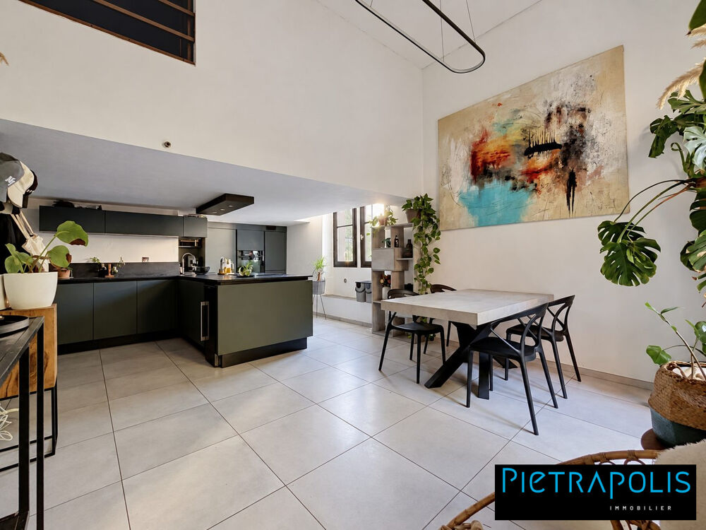 Appartement atypique de 100 m² au sol avec terrasse  Jusqu?