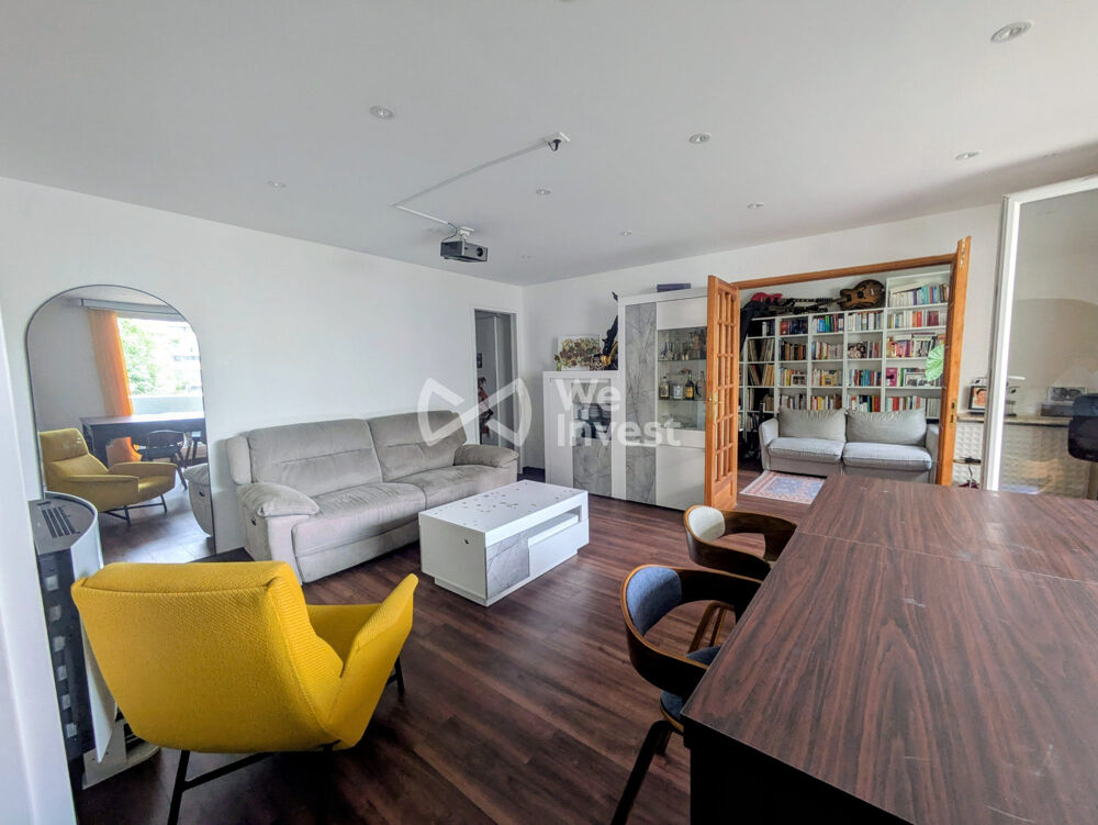 Appartement 3 chambres , stationnement et cave