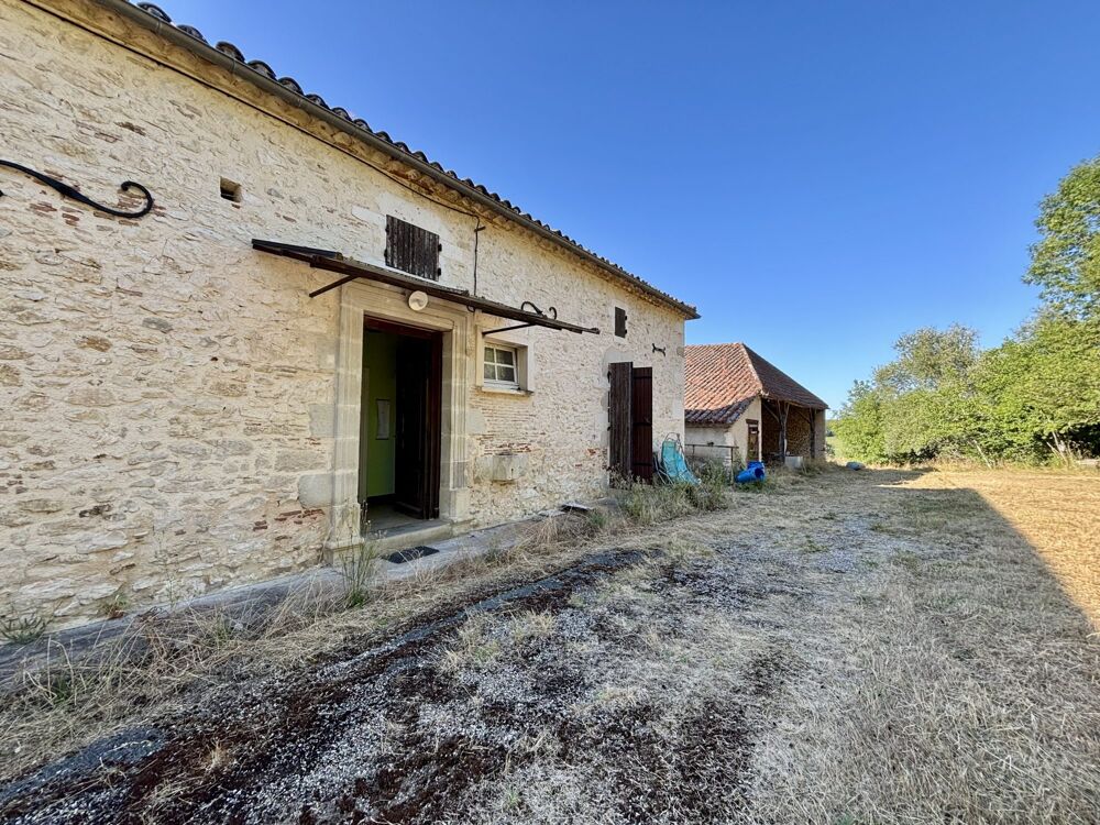 Charmant ensemble immobilier comprenant une grange et des dépen