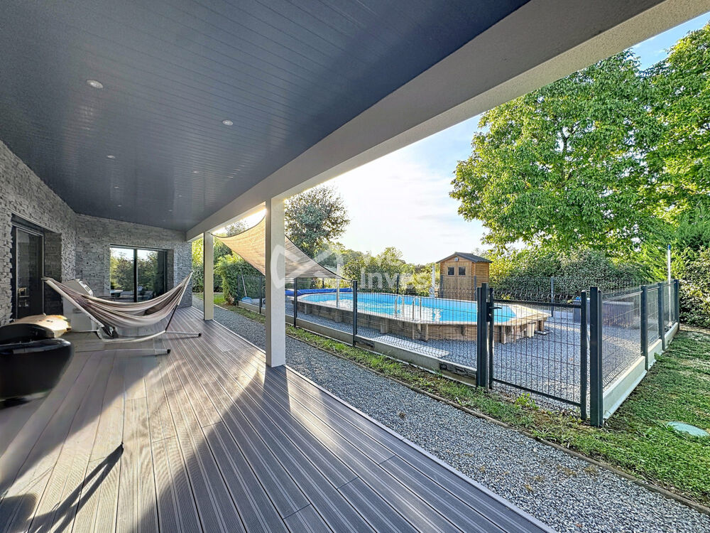 Villa de plain-pied de 225m2 avec piscine, garage et jardin.