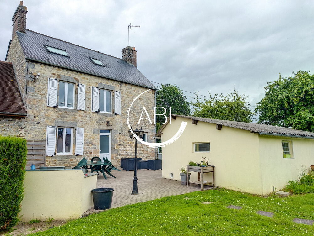 Maison de 105 m² avec garage et bâtiment