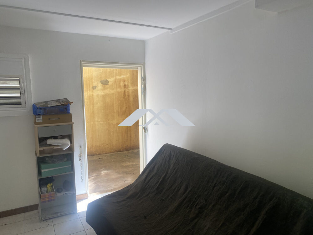 Appartement T2/T3 RDC - d'environ 70m² - Libre de suite