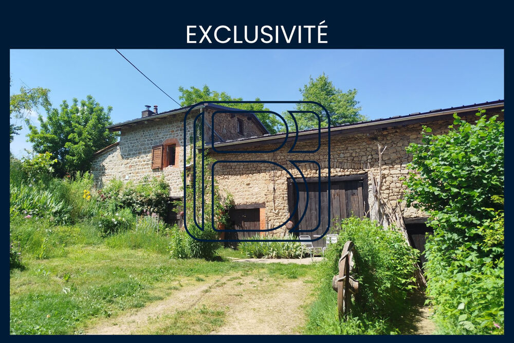 Maison de campagne divisée en deux avec terrain